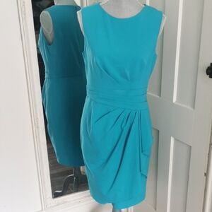 Calvin Klein elegant teal sheath sleeveless faux wrap front. Size 8.
